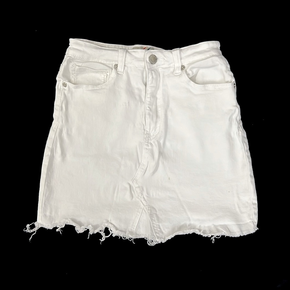 White mini denim skirt. Size small. Used.